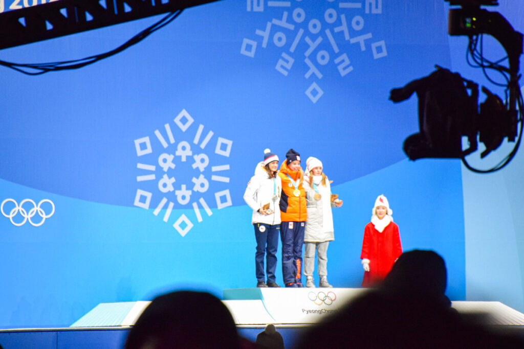 Winners getting awarded medals at the Medal Plaza