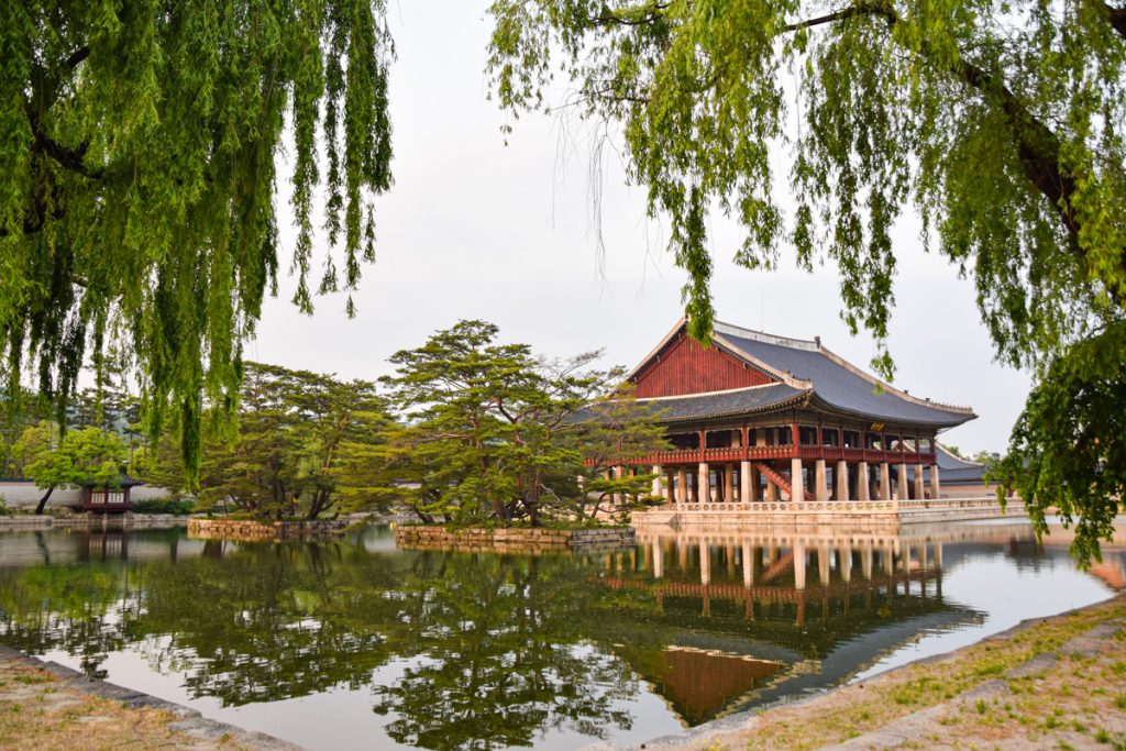 Gyeonghoeru Pavillion at Gyeongbokgung Palace through some trees
